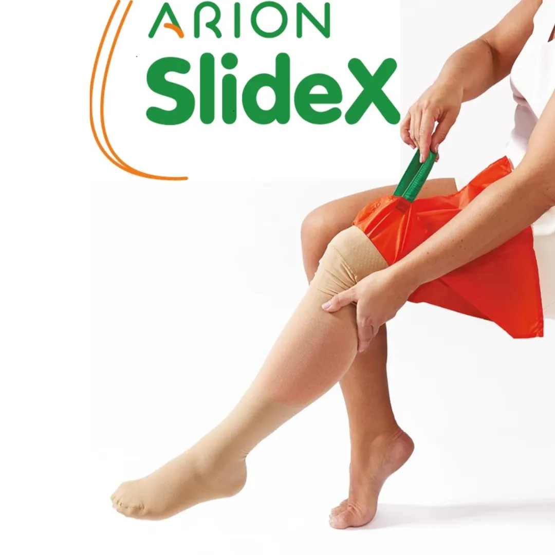 Person applying Arion SlideX stocking aid to leg